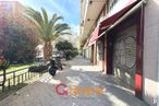 Retail for sale at Calle Virgen de la Alegría, Ciudad Lineal, Madrid, 28027 with plant, building, sky, infrastructure, tree, road surface, asphalt, window, neighbourhood and arecales around