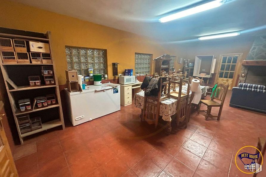 Industrial for sale at Polígono Campsa, Cuenca, 16004 with chair, light fixture, bookcase, lighting, furniture, property, wood, interior design, floor and flooring around