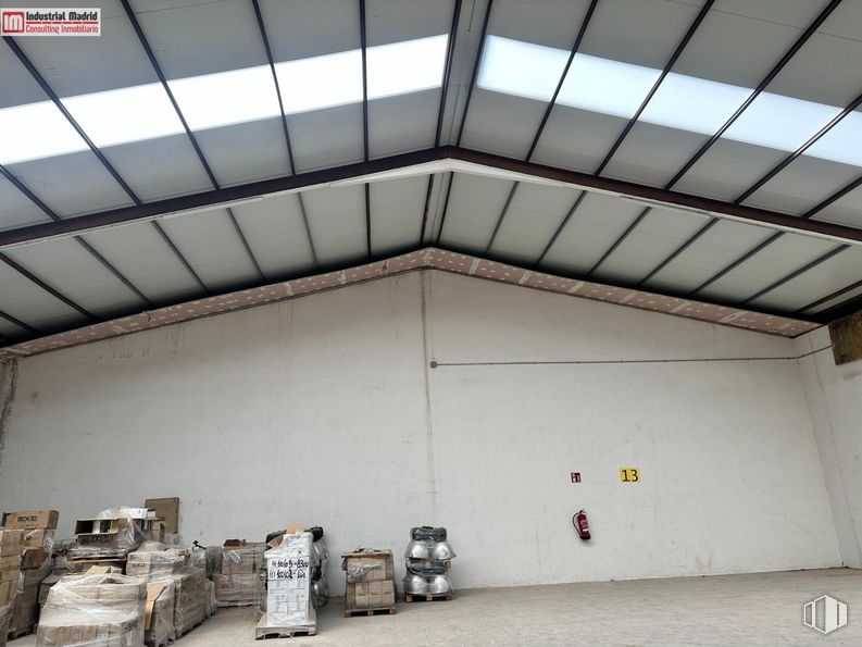 Industrial for rent at Calle Brezo, Arganda del Rey, Madrid, 28500 with packaged goods, interior design, shade, building, art, flooring, facade, beam, roof and hall around