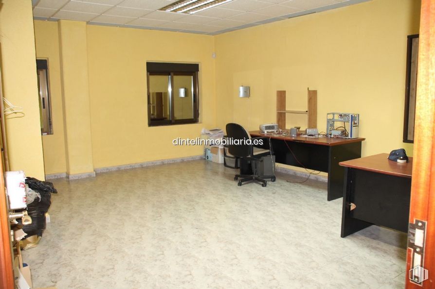 Industrial for sale at Polígono Vicolozano, Ávila, 05194 with chair, desk, table, fixture, interior design, floor, flooring, hall, television and ceiling around