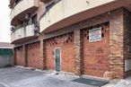 Retail for rent at Calle Ugena, 64, Yuncos, Toledo, 45210 with building, wood, door, brickwork, brick, window, building material, city, facade and road surface around