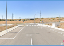 Land for sale at Zona Polígono Campo Tiro, Numancia de la Sagra, Toledo, 28049 with street light, sky, asphalt, road surface, line, urban design, building material, grass, road and landscape around