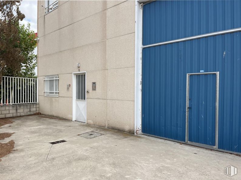 Industrial for sale at Camino Carrera, Fuente el Saz de Jarama, Madrid, 28140 with door, window, wood, architecture, asphalt, road surface, building, tree, composite material and fence around