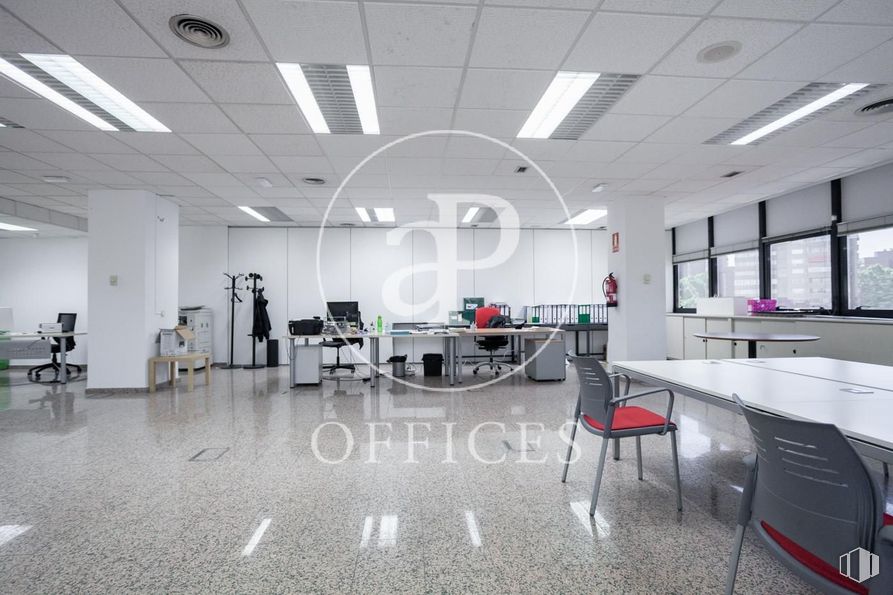 Office for rent at Zona nudo Norte Madrid, Fuencarral - El Pardo, Madrid, 28034 with chair, lighting, furniture, table, building, automotive design, fixture, flooring, floor and wall around