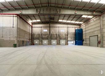 Industrial for rent at Zona San Agustín, San Agustín del Guadalix, Madrid, 28750 with door, light fixture, building, fixture, hall, floor, flooring, ceiling, urban area and composite material around