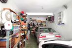 Retail for sale at Calle Luis Piernas, Ciudad Lineal, Madrid, 28017 with car, automobile repair shop, shelf, shelving, workshop, garage, parking, automotive tail & brake light and basement around