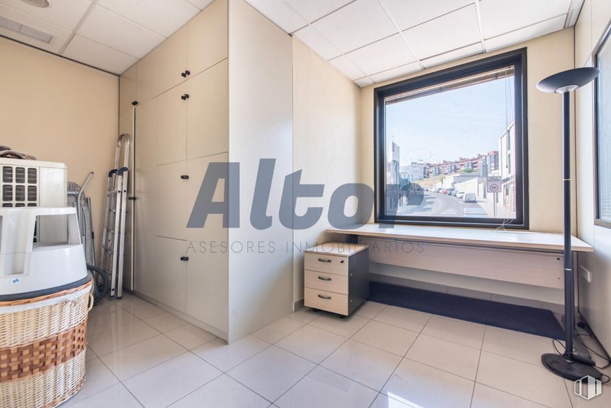 Retail for sale at Calle Rocinante, Fuencarral - El Pardo, Madrid, 28034 with window, door, nightstand, chest of drawers, light fixture, product, building, television, comfort and interior design around