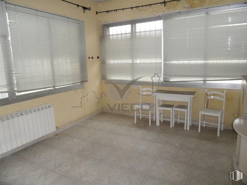 Industrial for sale at Avenida Rey Juan Carlos I, Cuenca, 16004 with window blind, chair, table, window, furniture, building, fixture, wood, house and shade around