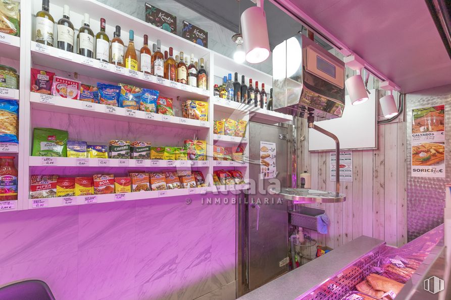 Retail for sale at Galerías Juan de Austria, Alcalá de Henares, Madrid, 28804 with lighting, light fixture, shelf, bottle, purple, interior design, wall, building, shelving and magenta around