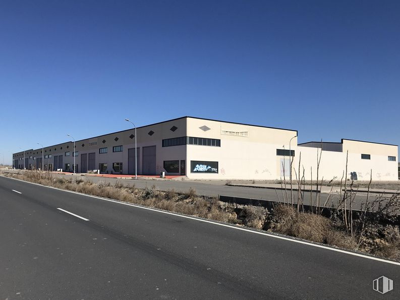 Industrial for sale at Terreno Sector 4, 81, Barcience, Toledo, 45525 with building, sky, street light, road surface, asphalt, land lot, tar, residential area, urban design and real estate around