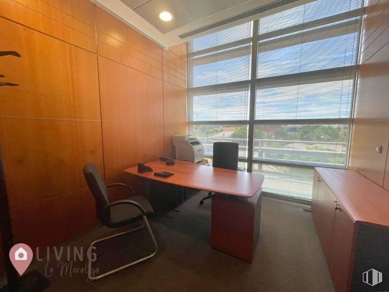 Office for rent at Zona Valdelacasa, Alcobendas, Madrid, 28108 with chair, desk, window, window blind, cabinetry, table, printer, furniture, fixture and building around