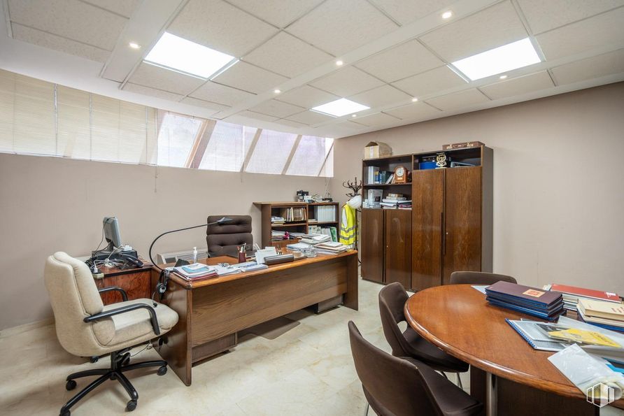 Office for sale at Zona Auditorio, Las Rozas de Madrid, Madrid, 28230 with chair, desk, light fixture, table top, lighting, bookcase, furniture, interior design, flooring and ceiling around