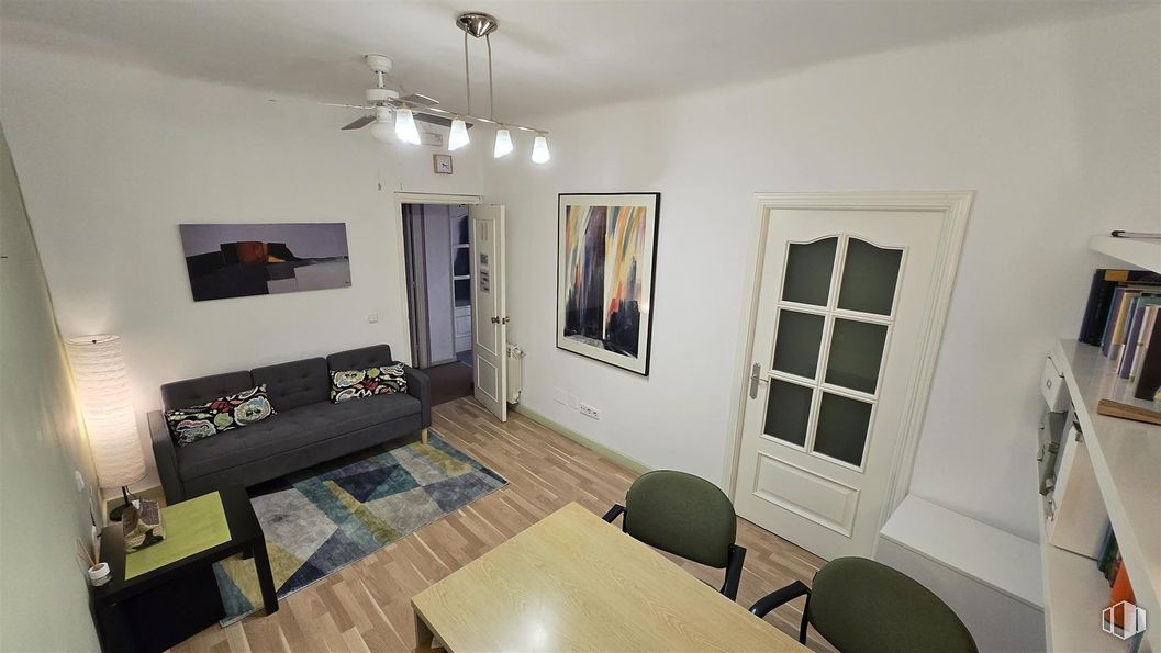 Office for rent at Calle Carranza, 3, Centro, Madrid, 28004 with couch, picture frame, door, table, light fixture, table top, chair, furniture, flooring and interior design around