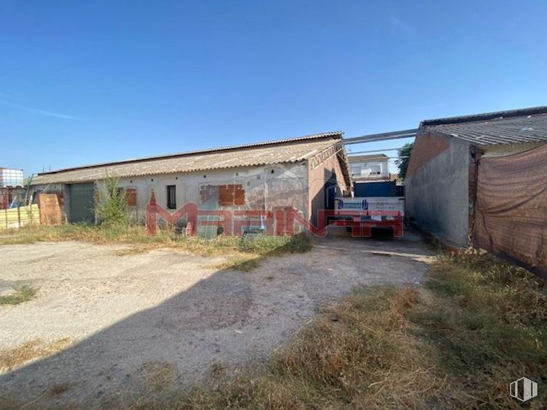 Industrial for sale at Calle San Roque, Esquivias, Toledo, 45221 with sky, plant, vehicle, land lot, road surface, motor vehicle, tire, asphalt, car and landscape around