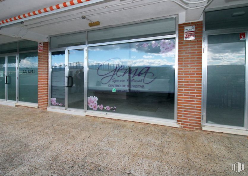 Retail for sale at Calle Olmo Caraquiz, Uceda, Guadalajara, 19188 with shade, facade, automotive exterior, gas, city, glass, commercial building, awning, signage and concrete around