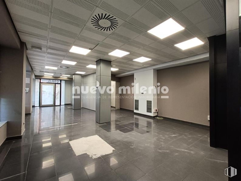 Retail for sale & for rent at Zona Los Castillos - Valderas, Alcorcón, Madrid, 28925 with lighting, light fixture, floor, flooring, ceiling, glass, commercial building, tile flooring, headquarters and daylighting around