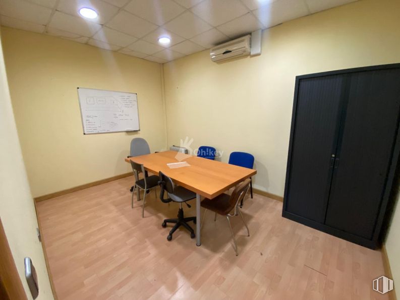 Industrial for sale at Calle Plomo, San Martín de la Vega, Madrid, 28330 with chair, table, cupboard, desk, wardrobe, furniture, flooring, floor, interior design and lighting around