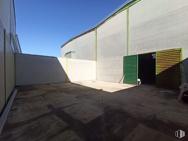 Industrial for sale at Polígono industrial Yuncos, Yuncos, Toledo, 45210 with sky, shade, road surface, fixture, rectangle, composite material, asphalt, material property, facade and tints and shades around