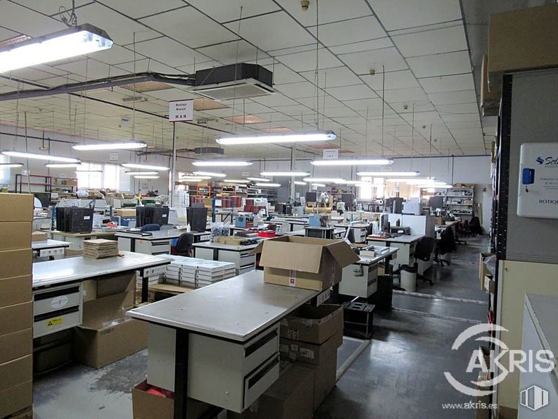 Industrial for sale at Calle Río Torviscal, Toledo, 45007 with lighting, box, cabinetry, table, furniture, fixture, building, chair, automotive design and desk around