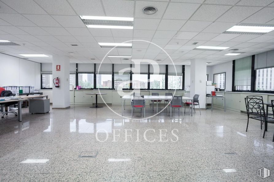 Office for rent at Zona nudo Norte Madrid, Fuencarral - El Pardo, Madrid, 28034 with chair, fixture, flooring, floor, building, window, hall, glass, ceiling and city around