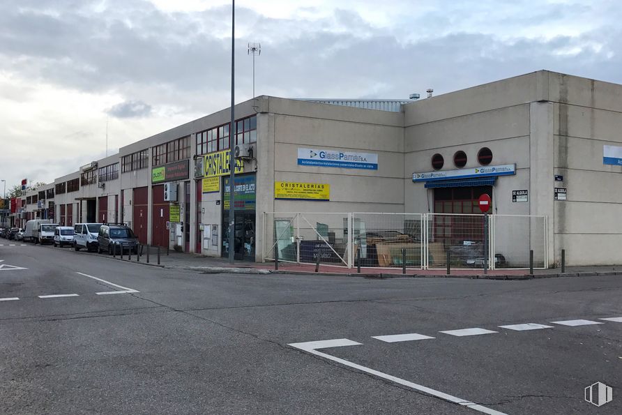 Industrial for sale at  Polígono industrial Európolis, Las Rozas de Madrid, Madrid, 28230 with building, automotive parking light, tire, cloud, sky, street light, wheel, car, asphalt and road surface around