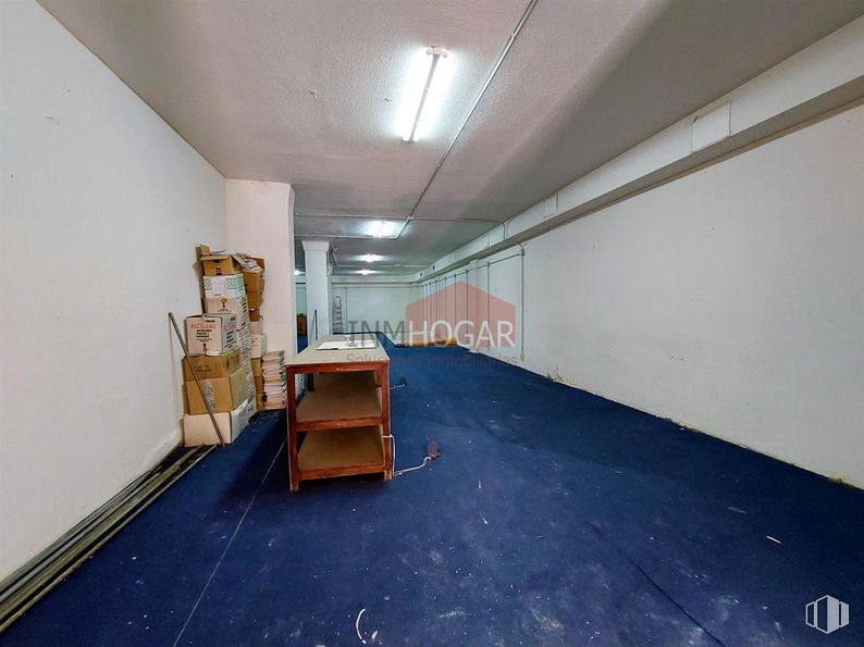 Industrial for sale at Zona Estación, Ávila, 05001 with furniture, building, chair, hall, floor, house, flooring, paint, wood and ceiling around