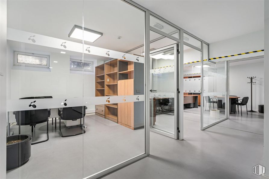 Office for rent at Avenida Portugal, La Latina, Madrid, 28011 with chair, light fixture, door, lighting, furniture, automotive design, fixture, eyewear, office chair and interior design around