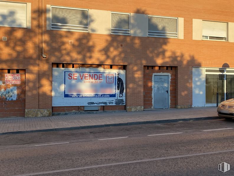 Retail for sale at Calle Malacuera, Torrelaguna, Madrid, 28180 with window, building, door, road surface, asphalt, facade, tints and shades, automotive lighting, brick and rectangle around