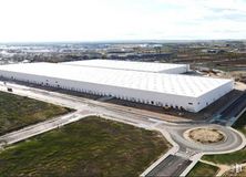 Industrial for rent at Illescas VI - VII, Polígono Industrial Carvacás I , Illescas, Toledo, 45200 with sky, cloud, building, land lot, air travel, urban design, landscape, window, city and roof around