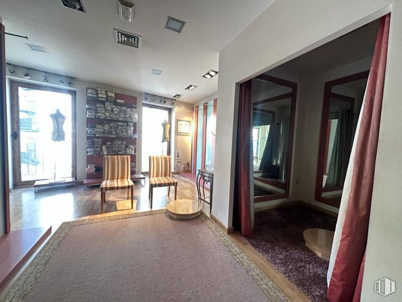 Retail for sale at Centro, Cuenca, 16001 with chair, picture frame, wood, interior design, hall, living room, door, building, flooring and wall around