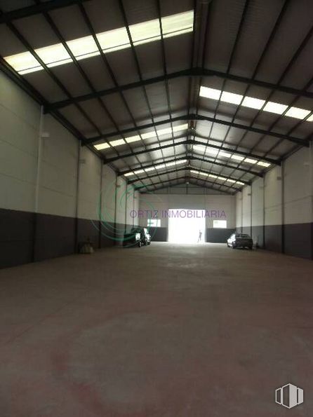 Industrial for rent at Polígono Industrial SEPES, Cuenca, 16004 with building, wheel, fixture, automotive design, automotive lighting, car, vehicle, hall, floor and parking around