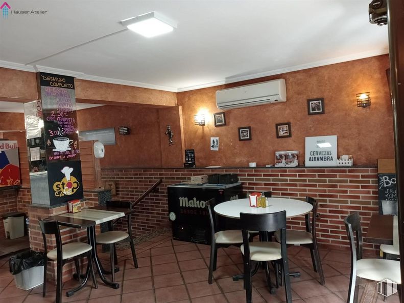 Retail for rent at Zona Fuentelarreina, Fuencarral - El Pardo, Madrid, 28034 with chair, kitchen & dining room table, light fixture, table, lighting, furniture, property, interior design, wood and floor around