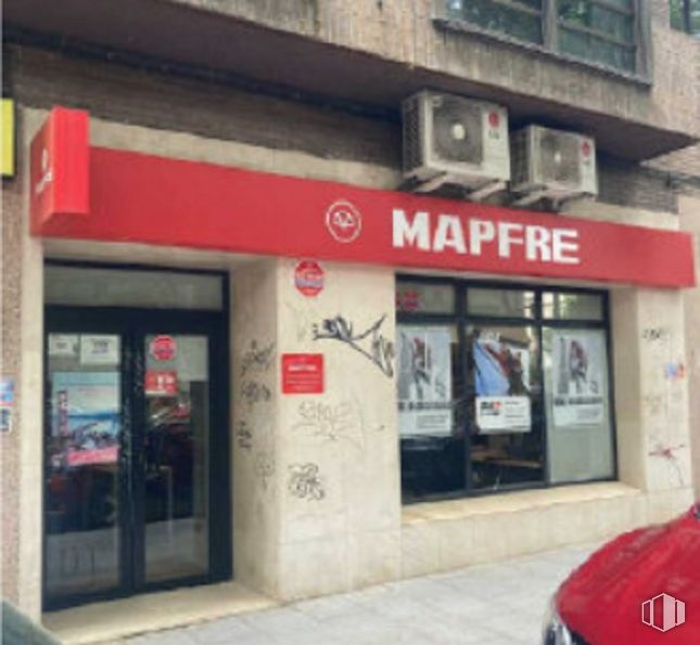 Retail for sale at Avenida Galaxia, Moncloa - Aravaca, Madrid, 28023 with car, window, door, commercial building, advertising, logo and sign around