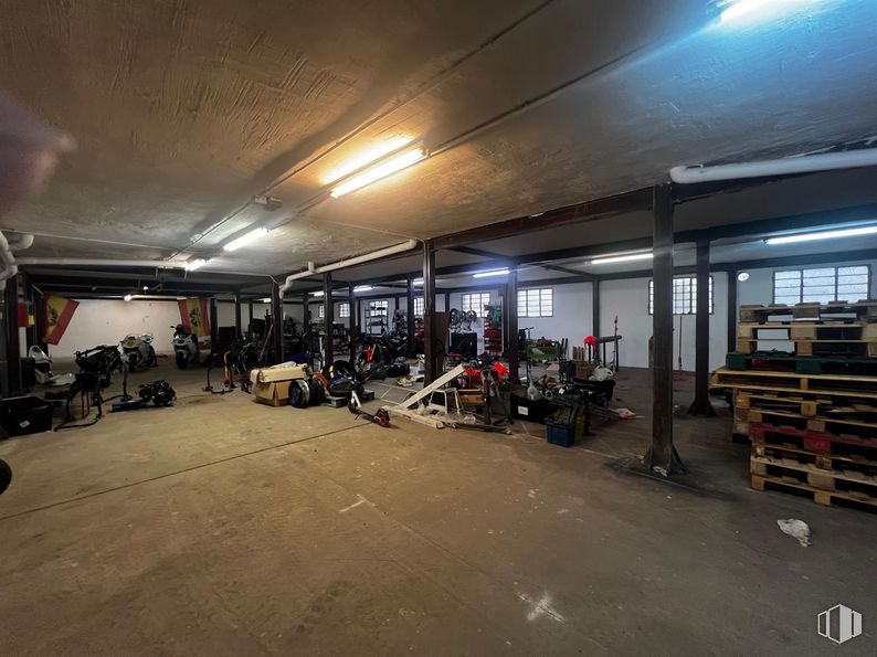 Industrial for sale at Urbanización Casablanca, Collado Villalba, Madrid, 28400 with lighting, light fixture, floor, flooring, gas, parking, hall, building, metal and city around