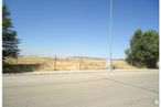 Land for sale at Calle Francisco Javier Sáenz de Oiza, 14, Villalbilla, Madrid, 28810 with street light, sky, rectangle, tree, land lot, asphalt, slope, road surface, landscape and plain around