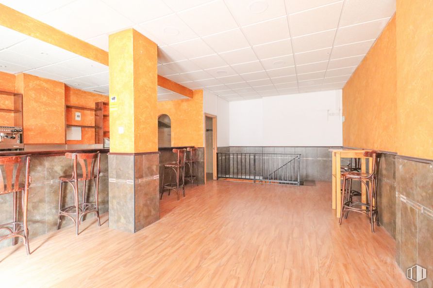 Retail for sale at Calle Juan Ramón Jiménez, Móstoles, Madrid, 28932 with furniture, building, wood, orange, hall, interior design, flooring, wood stain, floor and house around