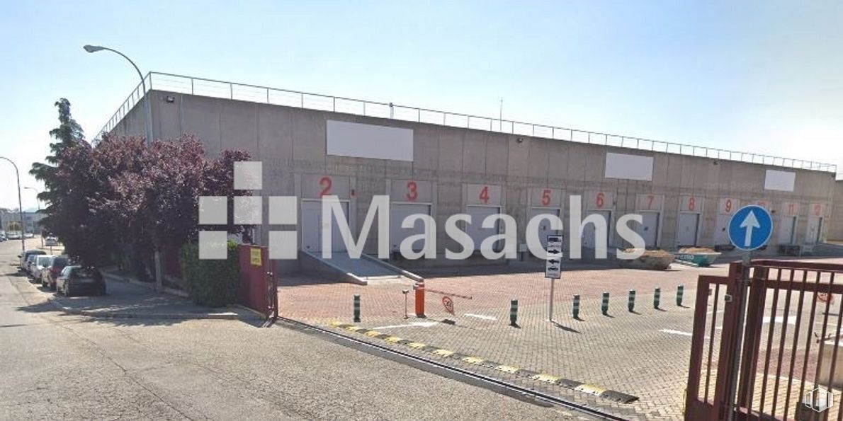 Industrial for rent at SEGRO Park Coslada I, Zona industrial , Coslada, Madrid, 28820 with sky, asphalt, facade, font, city, art, sport venue, graffiti, brick and commercial building around