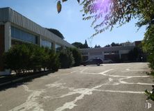 Industrial for sale & for rent at Zona industrial Paracuellos, Paracuellos de Jarama, Madrid, 28860 with building, sky, plant, daytime, property, wheel, infrastructure, road surface, tree and asphalt around