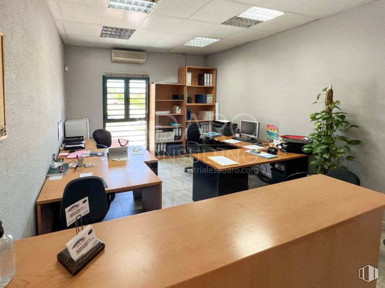 Industrial for sale at Calle Bronce, Cobeña, Madrid, 28863 with houseplant, desk, bottle, bookcase, chair, window, table top, furniture, interior design and office chair around