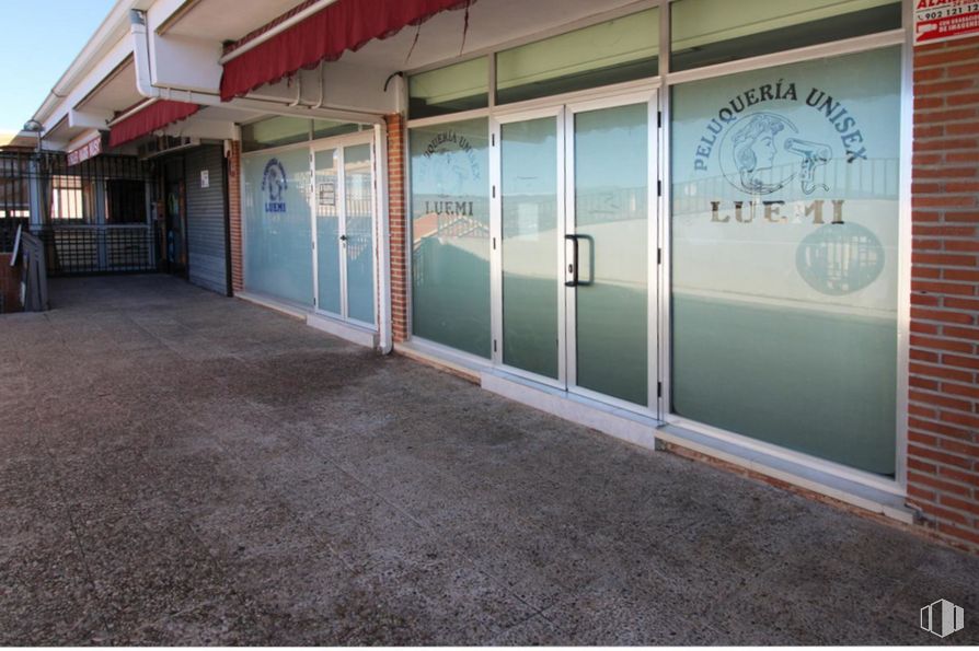 Retail for sale at Calle Olmo Caraquiz, Uceda, Guadalajara, 19188 with window, shade, facade, building, asphalt, road surface, sidewalk, city, door and concrete around