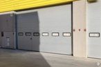 Industrial for sale at Calle Laguna del Marquesado, Villaverde, Madrid, 28021 with door, yellow, wood, fixture, asphalt, siding, road surface, facade, composite material and garage door around