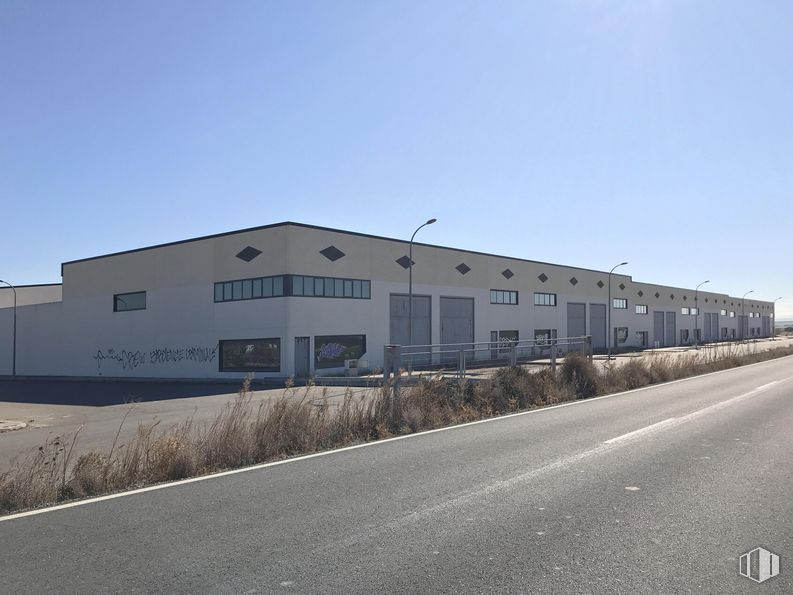 Industrial for sale at Terreno Sector 4, 74, Barcience, Toledo, 45525 with building, sky, window, plant, asphalt, facade, tar, real estate, landscape and composite material around