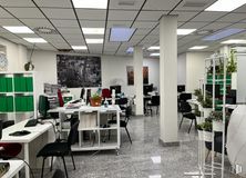 Office for rent at Barrio Almagro, Chamberí, Madrid, 28010 with chair, building, table, furniture, automotive design, desk, interior design, flooring, computer monitor and floor around