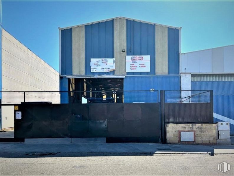 Industrial for sale at Poligono Alcamar, Camarma de Esteruelas, Madrid, 28816 with building, sky, asphalt, material property, facade, composite material, commercial building, rectangle, gas and tints and shades around