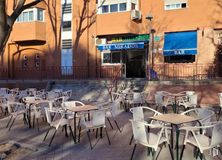 Retail for sale at Calle Hornachos, Puente de Vallecas, Madrid, 28053 with chair, building, table, window, kitchen & dining room table, furniture, restaurant, outdoor furniture, outdoor table and shade around