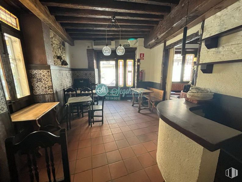 Retail for sale at Calle Cronista Lecea, Segovia, 40001 with chair, lighting, light fixture, window, kitchen & dining room table, table top, countertop, table, furniture and property around