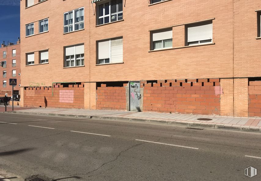 Retail for sale at Calle Antonio Buero Vallejo, Guadalajara, 19004 with window, building, property, orange, road surface, brickwork, asphalt, brick, urban design and neighbourhood around