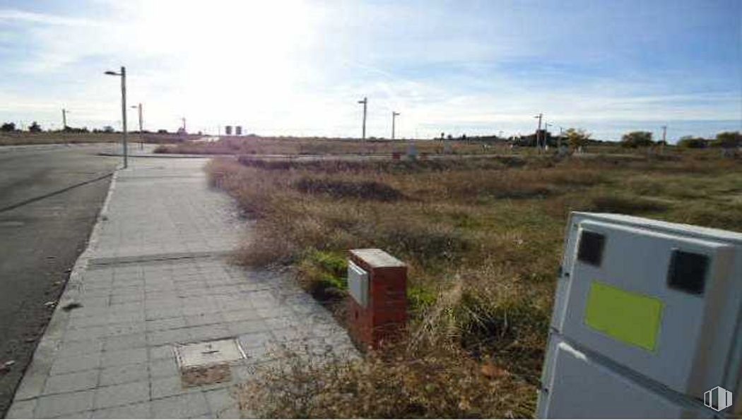 Land for sale at Avenida Pegaso, Griñón, Madrid, 28971 with sky, cloud, plant, ecoregion, land lot, street light, grass, asphalt, rural area and plain around