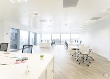 Office for rent at Paseo Castellana, 79, Tetuán, Madrid, 28046 with chair, table, furniture, desk, fixture, office chair, lighting, interior design, building and floor around