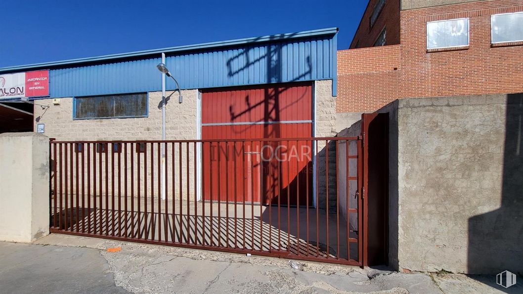 Industrial for sale at Polígono Hervencias, Ávila, 05004 with window, daytime, sky, wood, road surface, brick, fence, brickwork, composite material and material property around